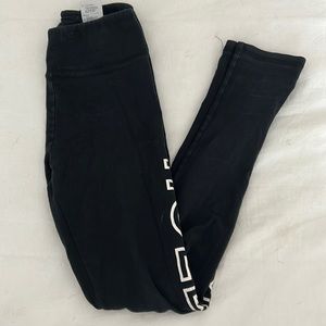 Black leggings. Size XS or 0. Says “HOLLISTER” down the left leg.
